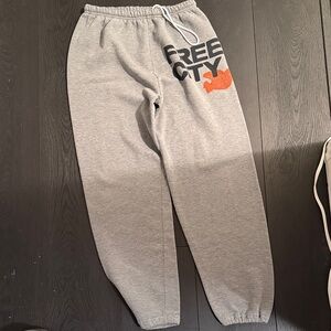 Freecity Gray Sweatpants with Black and Orange Logo
